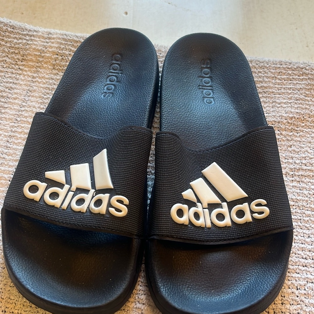 Adidas slides for kids size 5. Never worn.